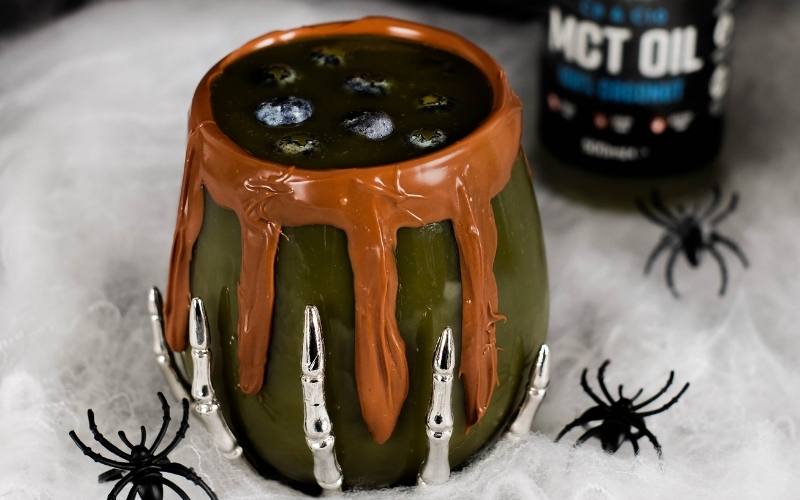 green chocolate drink in a glass bowl with collagen peptide protein powder