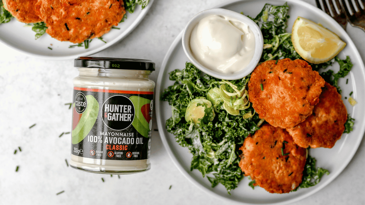 Salmon fish cakes on plate with avocado mayonnaise