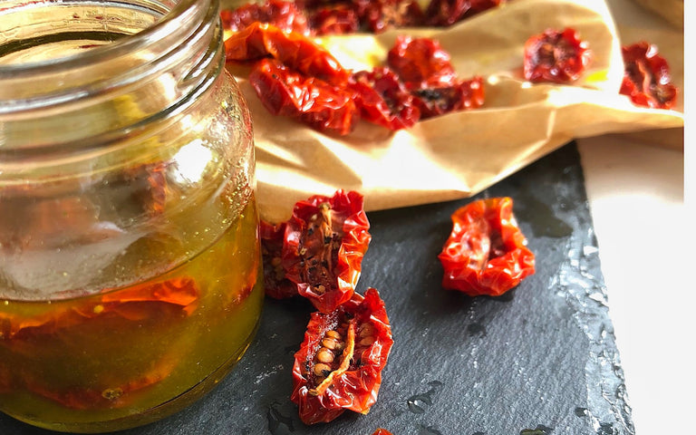 Jar with oil and dried tomato