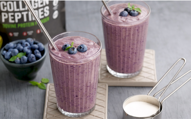 Two Smoothie drinks blueberry with collagen