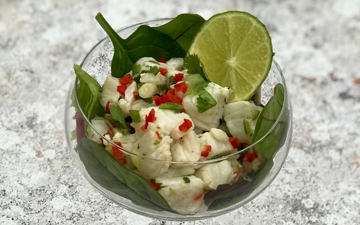 Fresh fish salad in a glass 