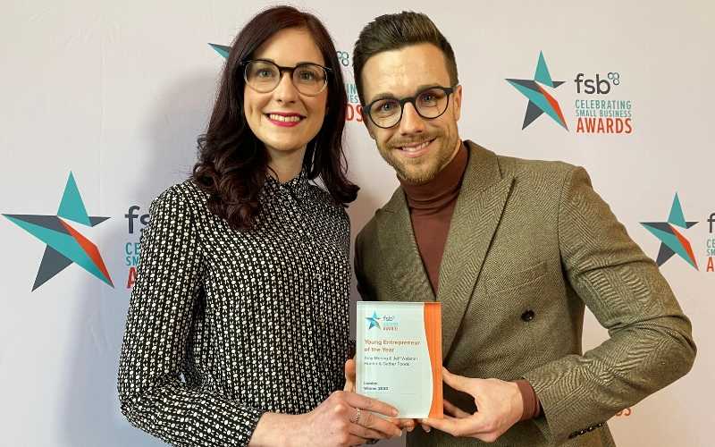 Co-founders of Hunter & Gather receiving award