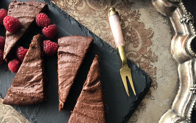 chocolate cake on metal platter