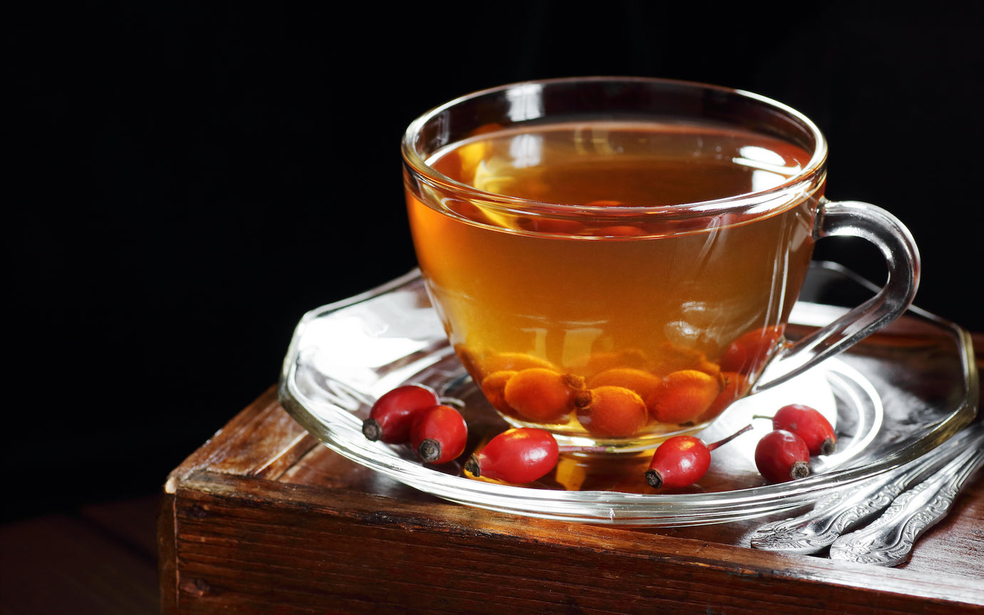 collagen tea: Cup of tea with red berries