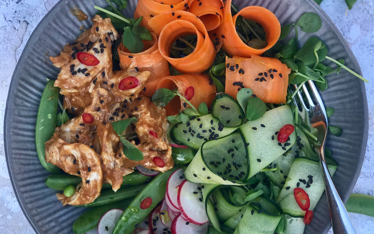 carrot and cucumber with chilli and salad dressing