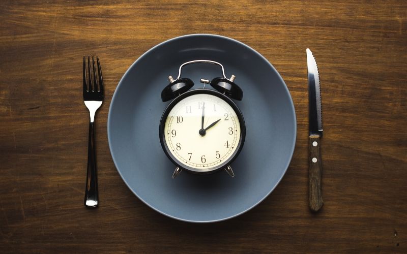 alarm clock on a plate