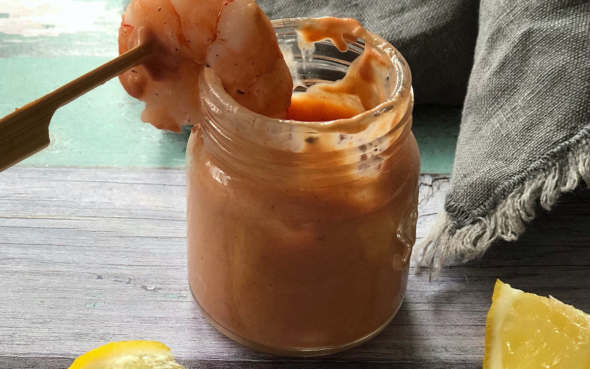 pink mayonnaise with lemon wedges 
