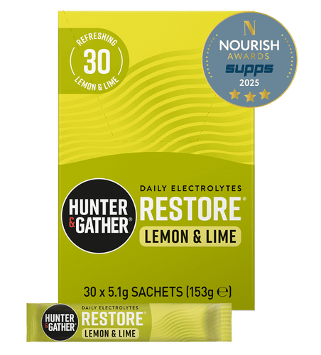 Hunter & Gather Restore Lemon & Lime electrolyte package with an award badge on a green background