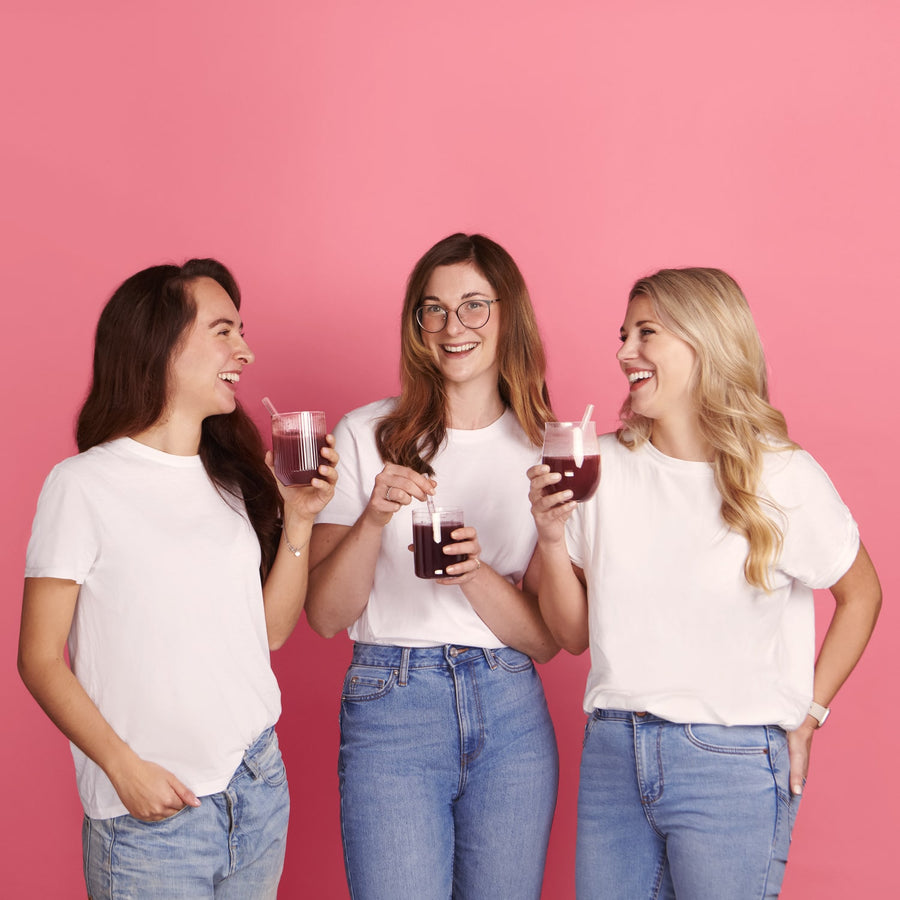 Three ladies enjoying Rise & Glow drink
