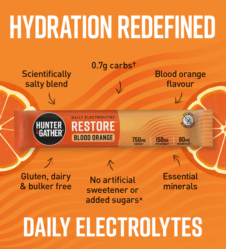  Hunter & Gather Restore Daily Electrolytes bar with blood orange flavor on an orange background