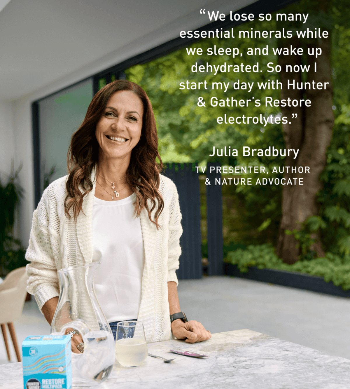 Julia Bradbury with a box of Hunter & Gather's Restore electrolytes.