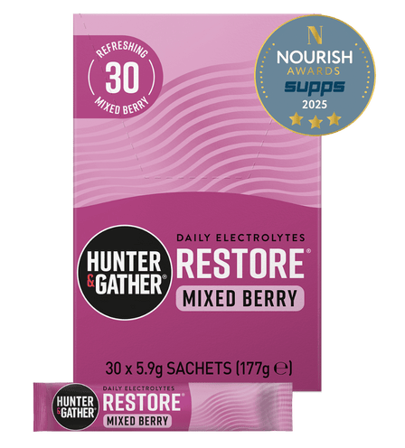 Purple package of Hunter & Gather Restore Mixed Berry electrolyte supplement with Nourish Awards badge on a green background