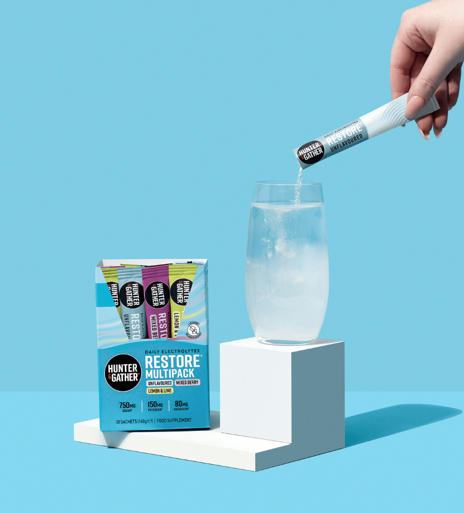 restore daily electorlytes multipack and glass of unflavoured electrolytes water